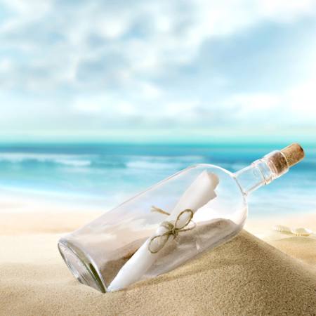 pudele, jūra, smiltis, papīrs, okeāns Silvae1 - Dreamstime
